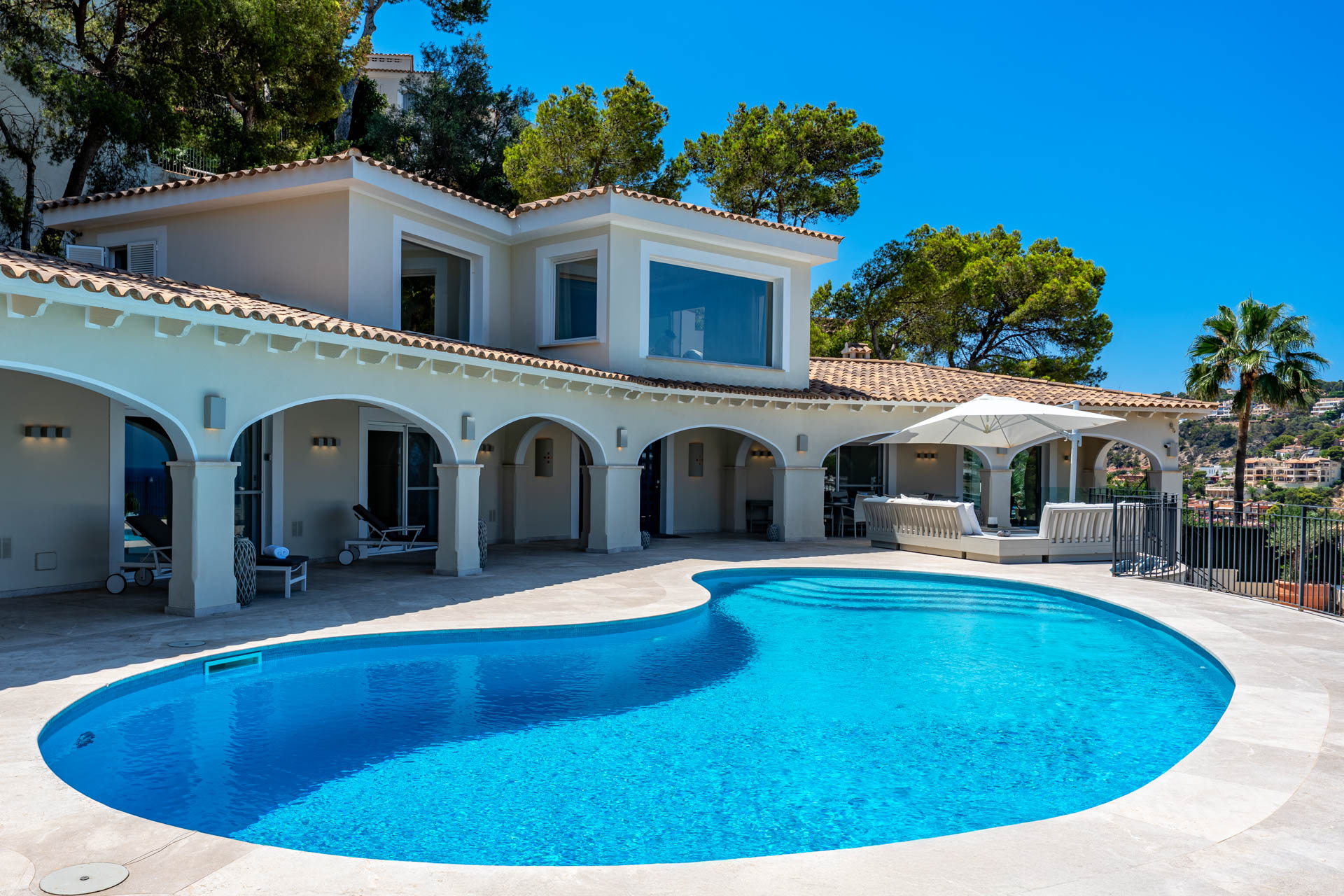 Modern mediterranean Villa with panoramic views of the sea, port, and mountains